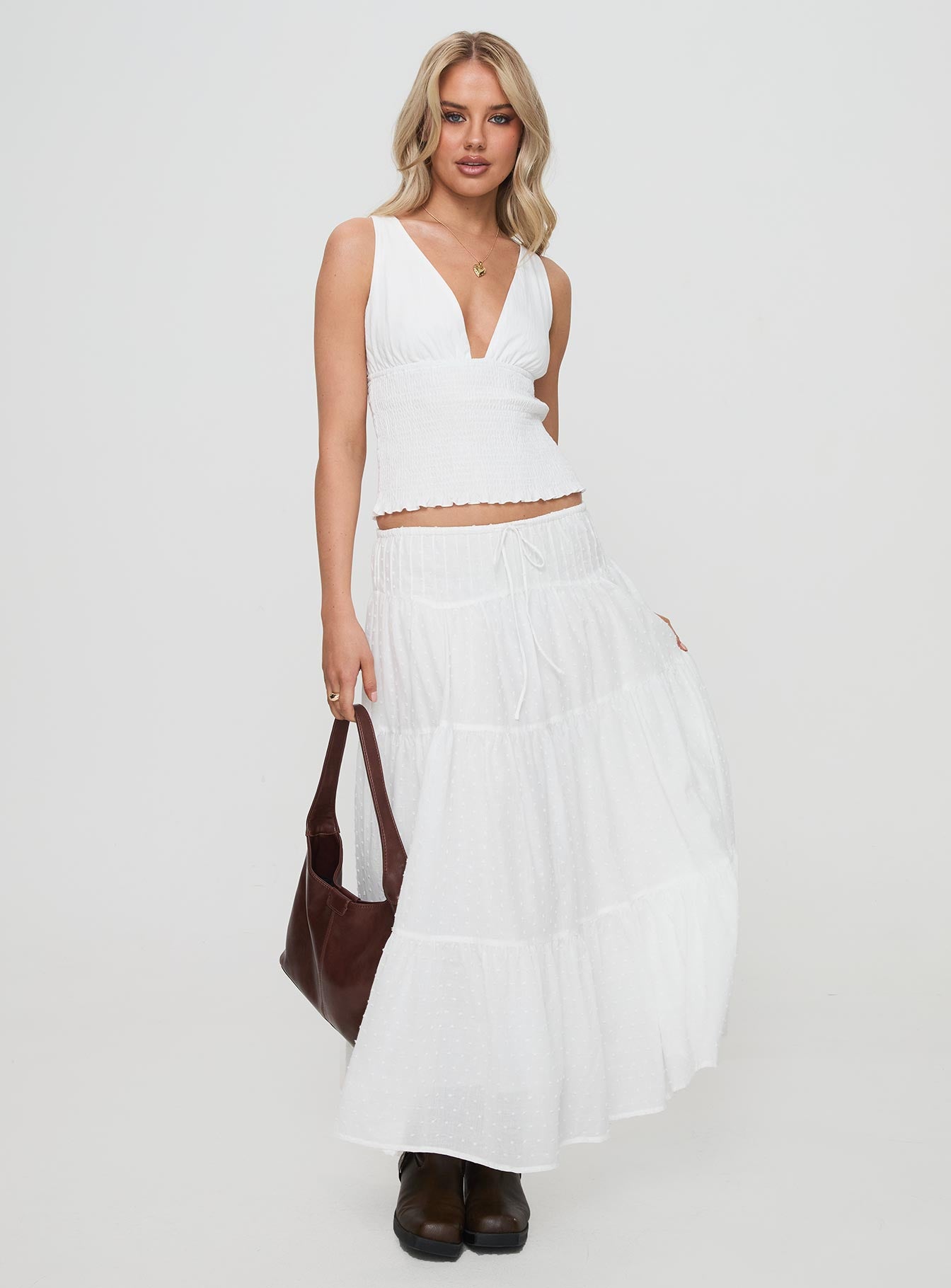   side view of model wearing Princess Polly Cherry On Top Maxi Skirt White Maxi 