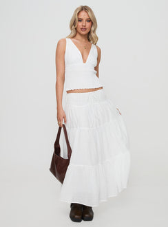   side view of model wearing Princess Polly Cherry On Top Maxi Skirt White Maxi 