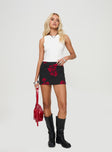 Black and red mini skirt Floral print, ruching detail at waist, invisible zip fastening, split hem at sides