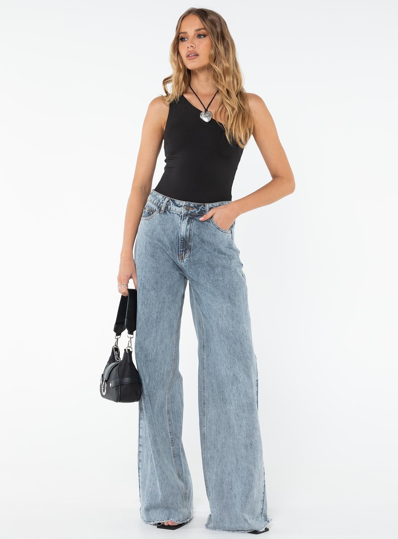 front view of model wearing Princess Polly Ranski One Shoulder Bodysuit Black Sleeveless Asymmetric Neckline 