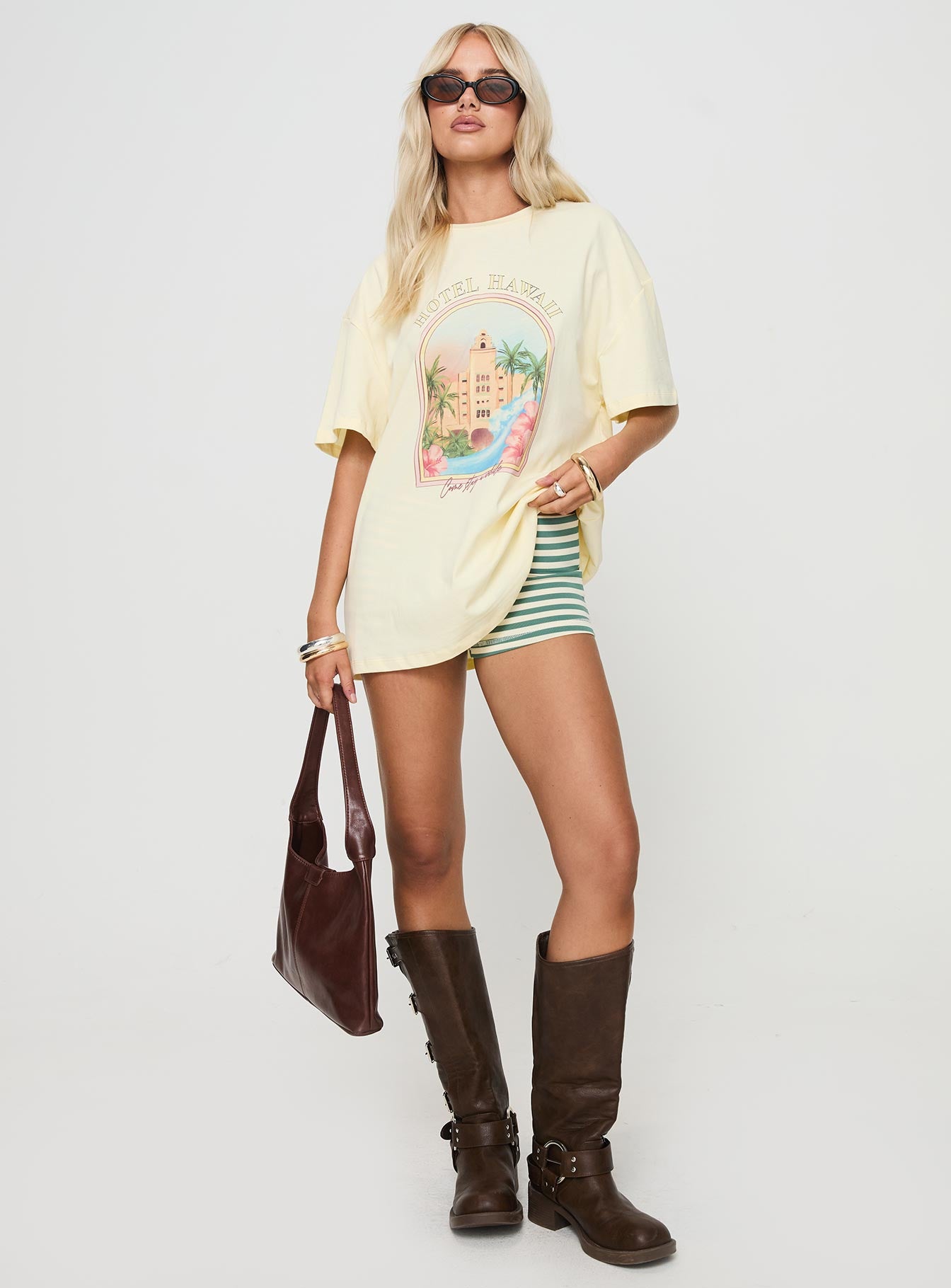 front view of model wearing Princess Polly Hotel Hawaii Oversized Tee Yellow Half Sleeves Crew Neck 