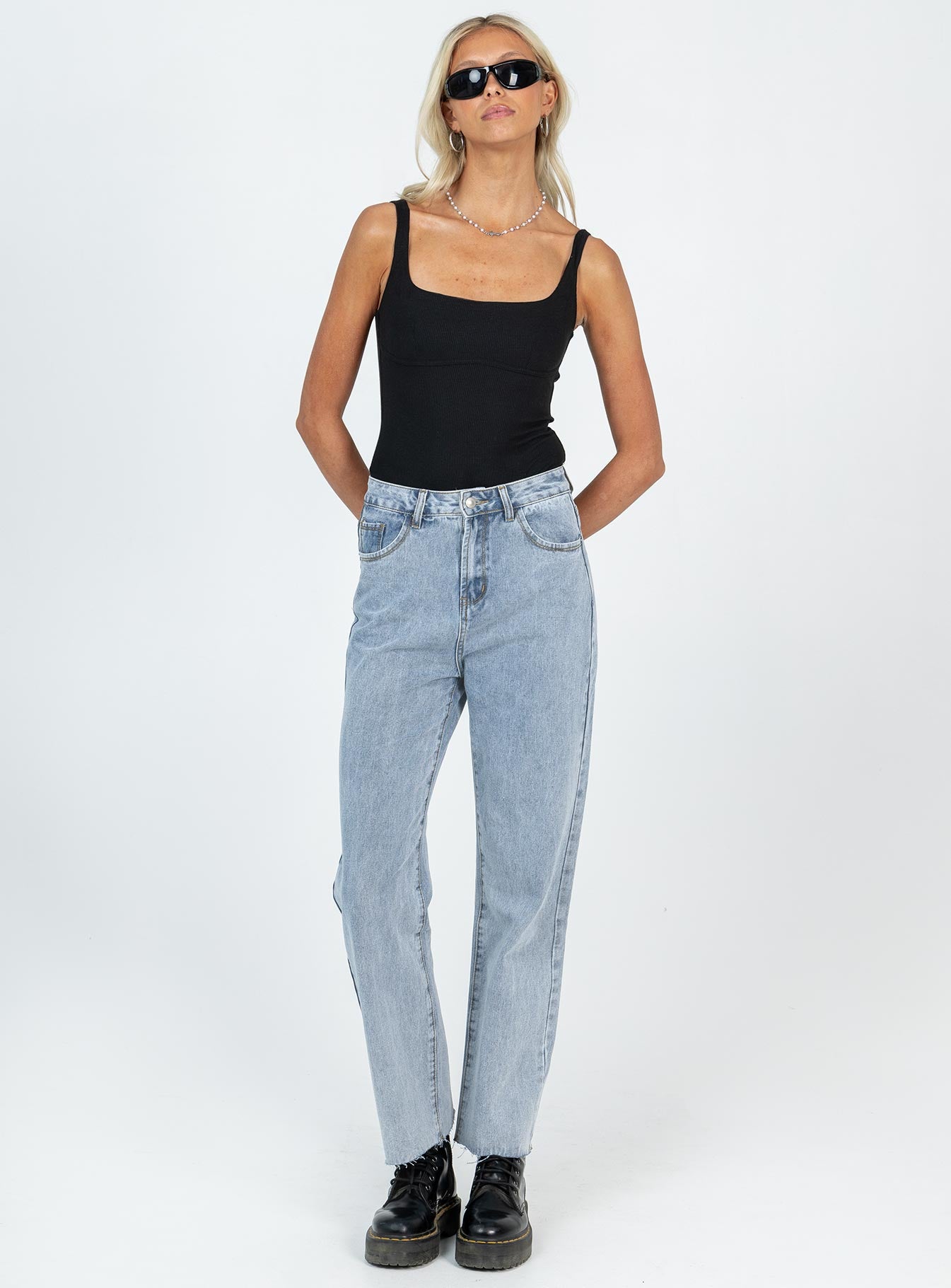 front view of model wearing Princess Polly Crosby Bodysuit Black Tall Sleeveless Square Neck 