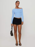 side view of model wearing Princess Polly Malian Long Sleeve Top Blue Full Sleeves Asymmetric Neckline 