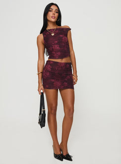 Two-piece matching set One-shoulder top, twist strap detail, ruching detail at sides Mini skirt, elasticated waistband, ruching detail at sides Good stretch, fully lined  Princess Polly Lower Impact 