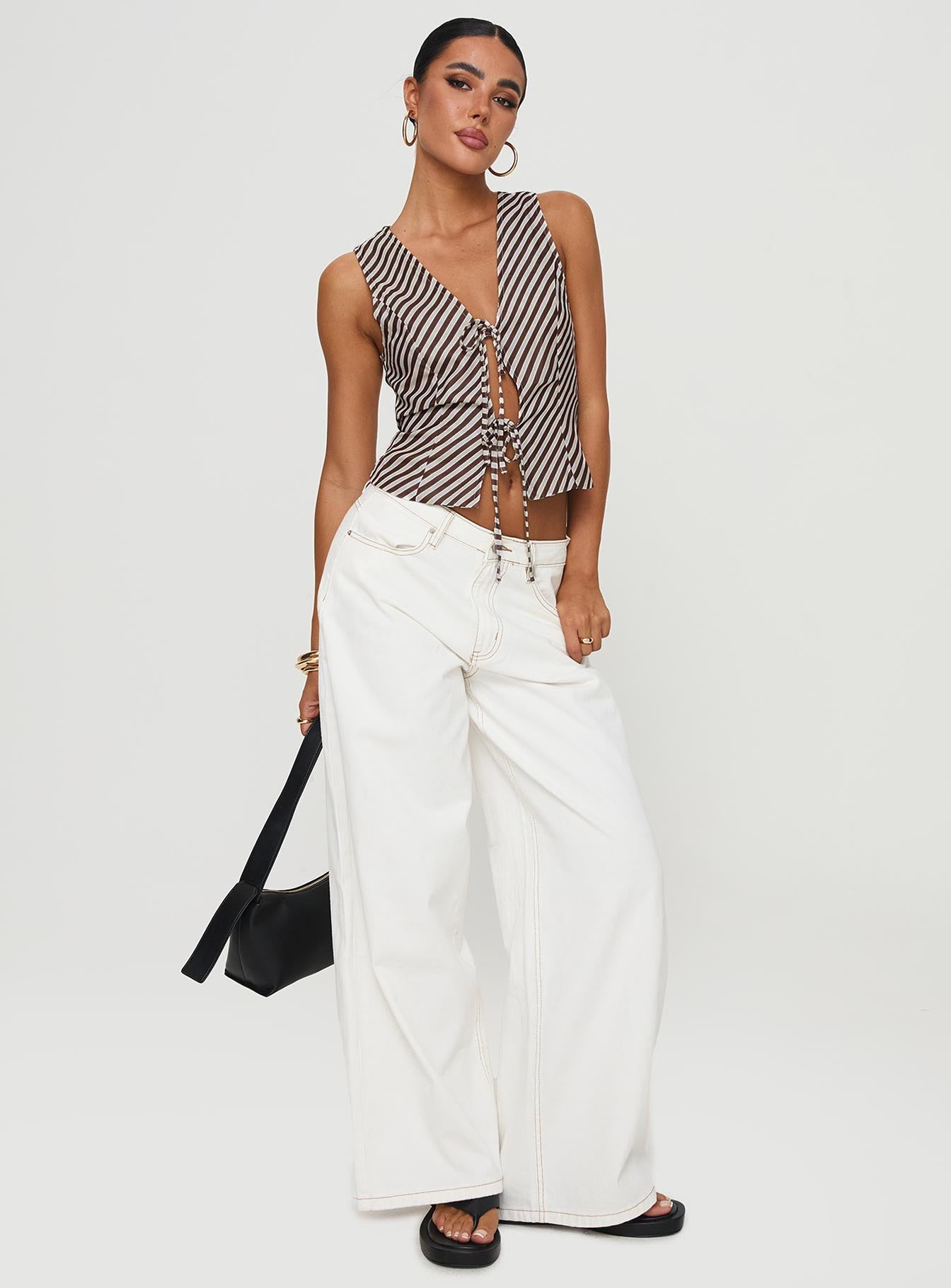 back view of model wearing Princess Polly Lishar Top Brown Stripe Sleeveless V-Neck 