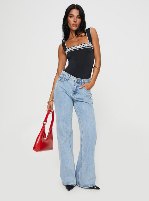 front view of model wearing Princess Polly Keating Bodysuit Black Tall Sleeveless 