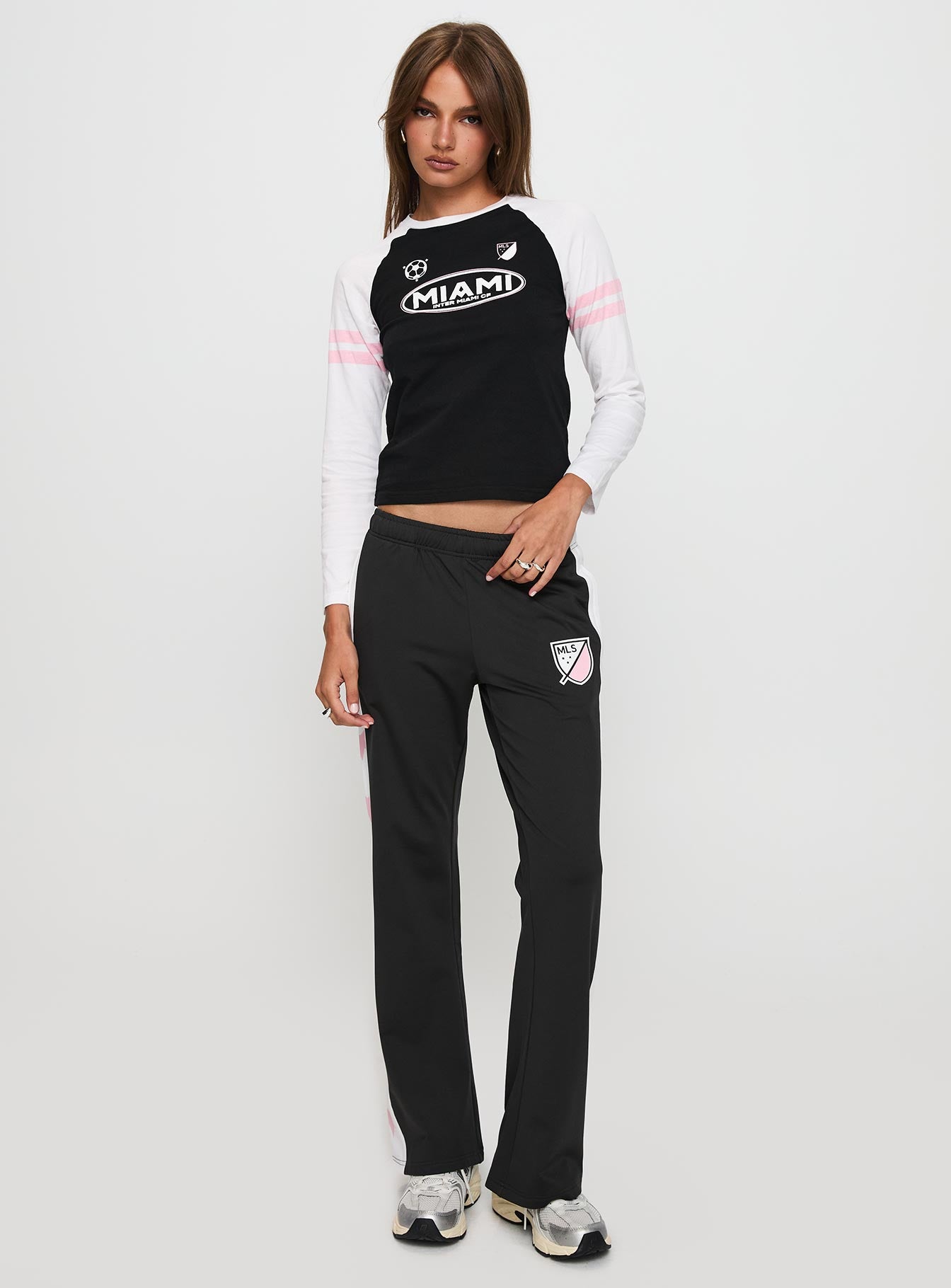front view of model wearing Princess Polly Track Star Pants Black Low Rise Pants 