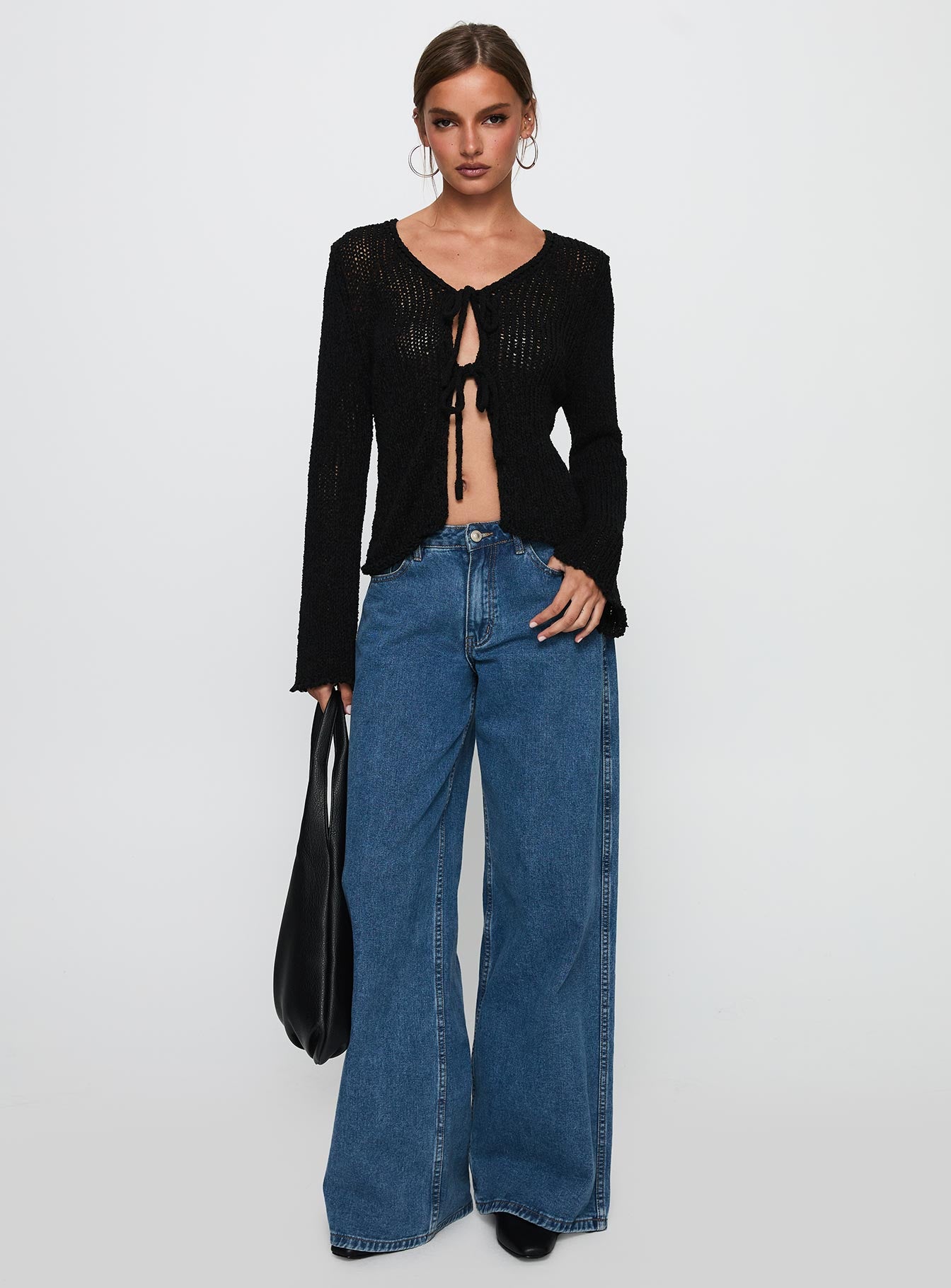 front view of model wearing Princess Polly Swain Knit Cardigan Black Cropped Jumpers 