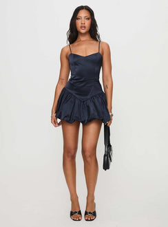 side view of model wearing Princess Polly Dollhouse Mini Dress Navy V-Neck 