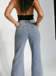 back view of model wearing Princess Polly Thearlie High Flare Jean Light Wash High Waisted 