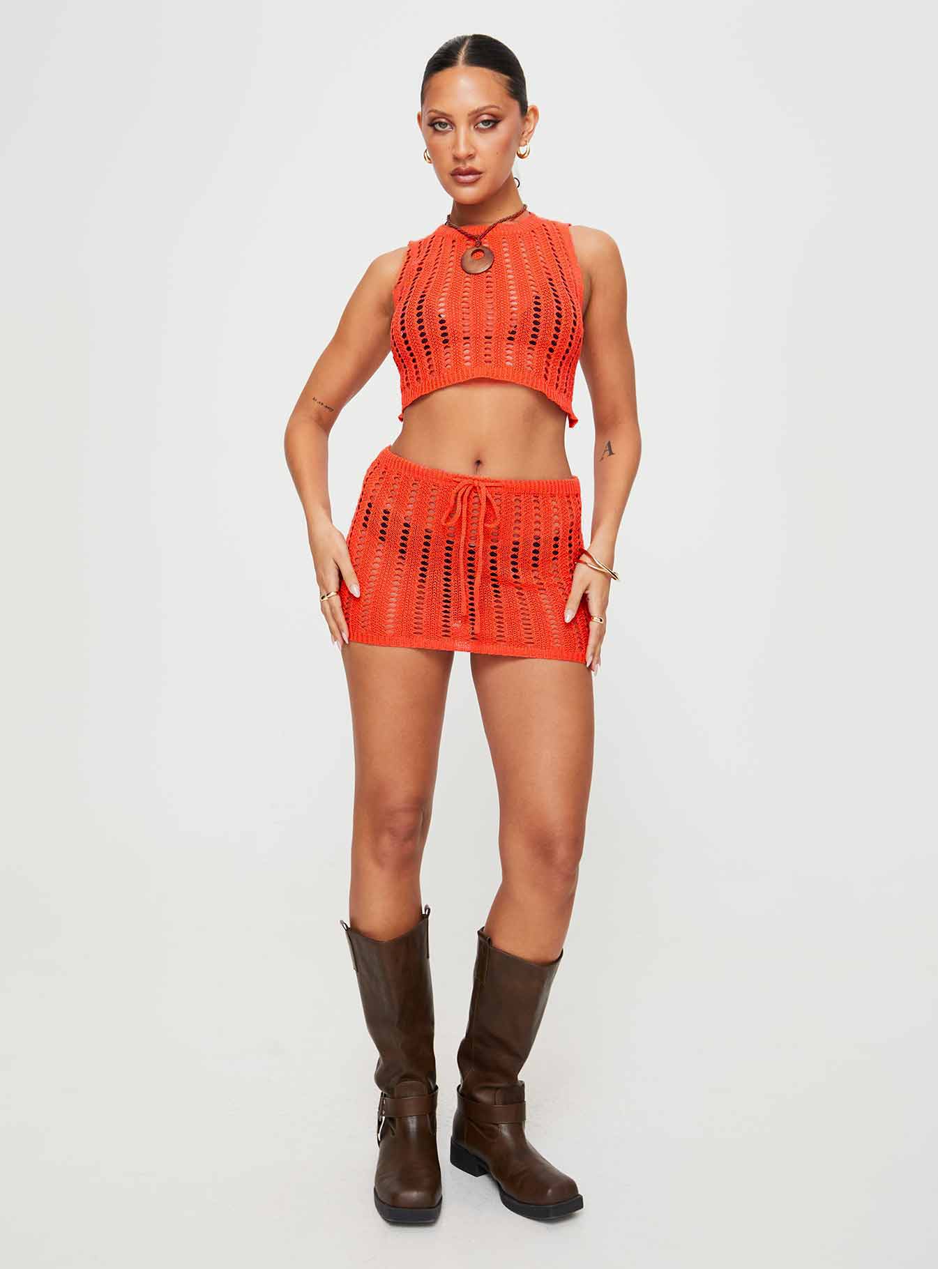 Two-piece knit set Crop top, high neckline, large cut out at back, tie fastening Mid-rise mini skirt, drawstring waist with tie fastening