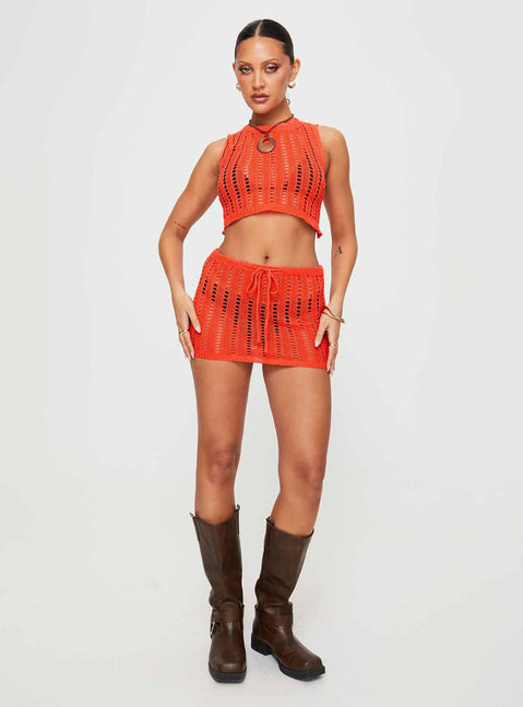 Two-piece knit set Crop top, high neckline, large cut out at back, tie fastening Mid-rise mini skirt, drawstring waist with tie fastening