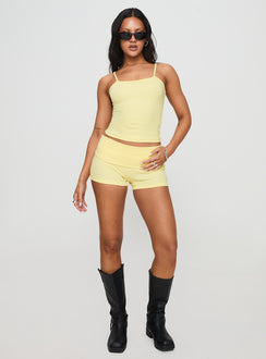 front view of model wearing Princess Polly Baseline Rib Top Yellow Sleeveless Square Neck 