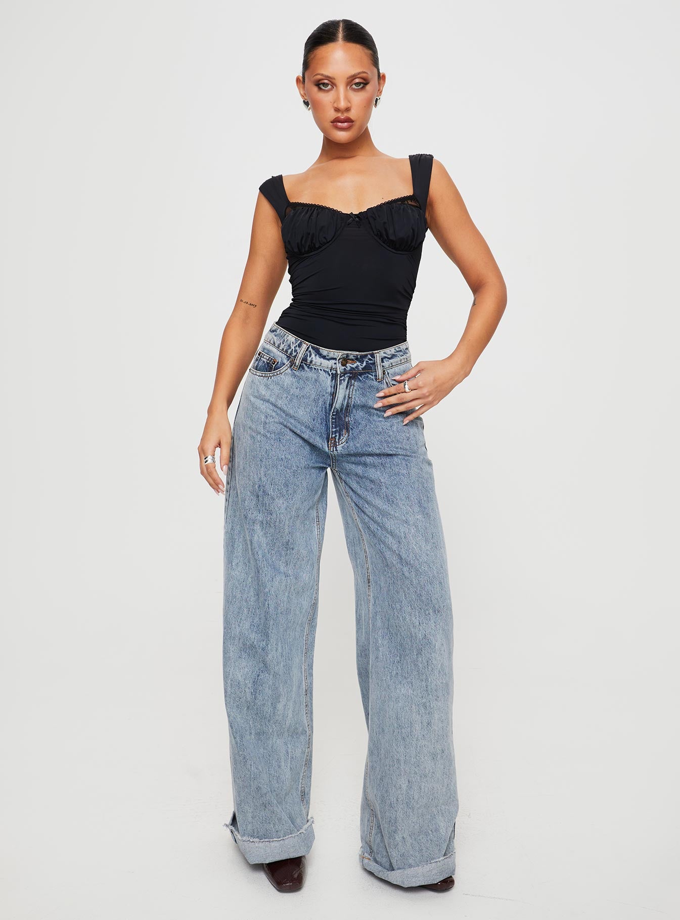 front view of model wearing Princess Polly Weller Bodysuit Black Sleeveless 