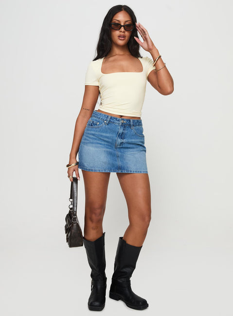  front view of model wearing Princess Polly Paulette Denim Mini Skirt Light Wash Mini Skirts 
