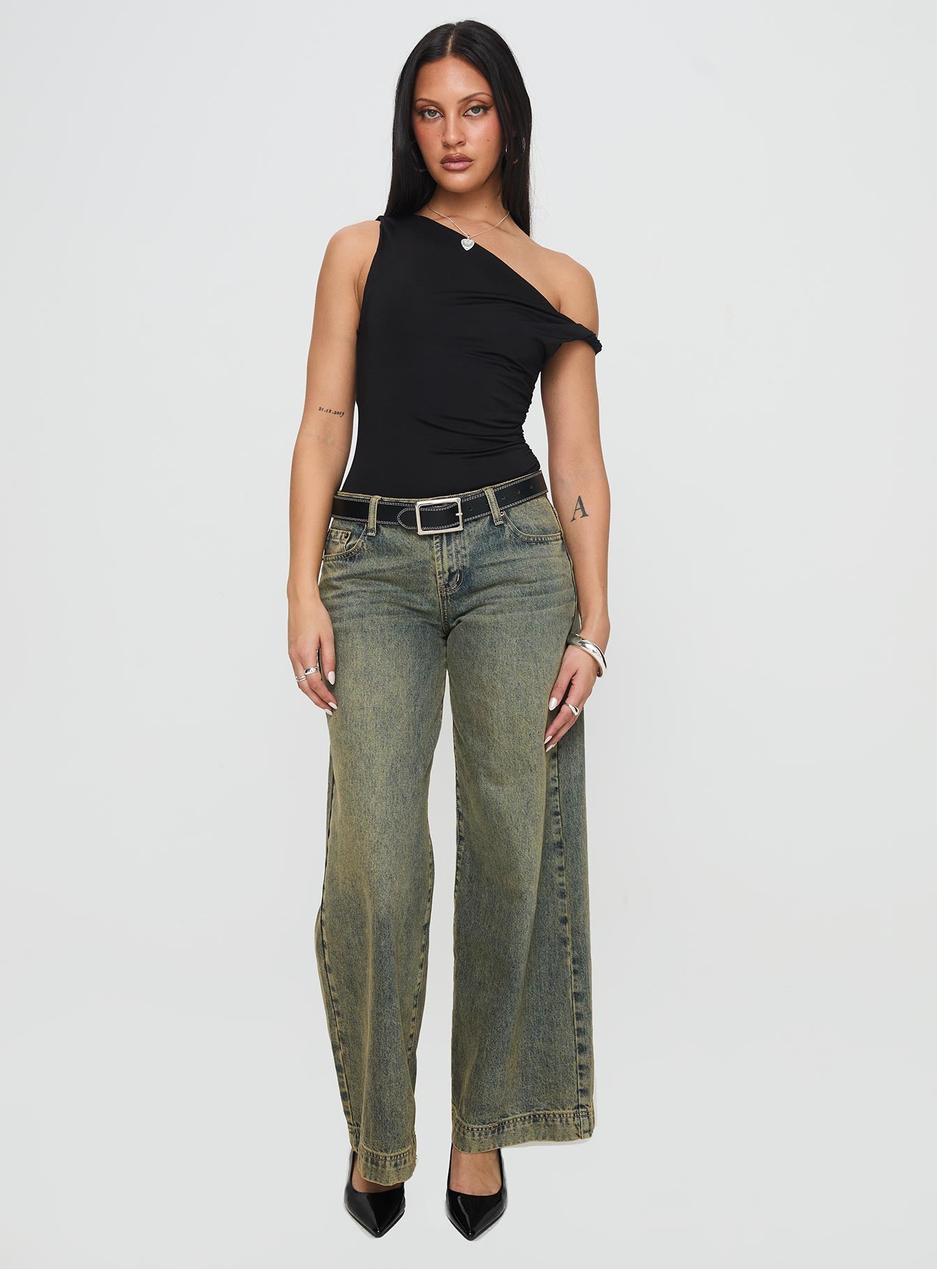 side view of model wearing Princess Polly Leclerc Bodysuit Black Sleeveless Asymmetric Neckline 