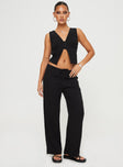 front view of model wearing Princess Polly Zanzibar Pants Black Low Rise Pants 