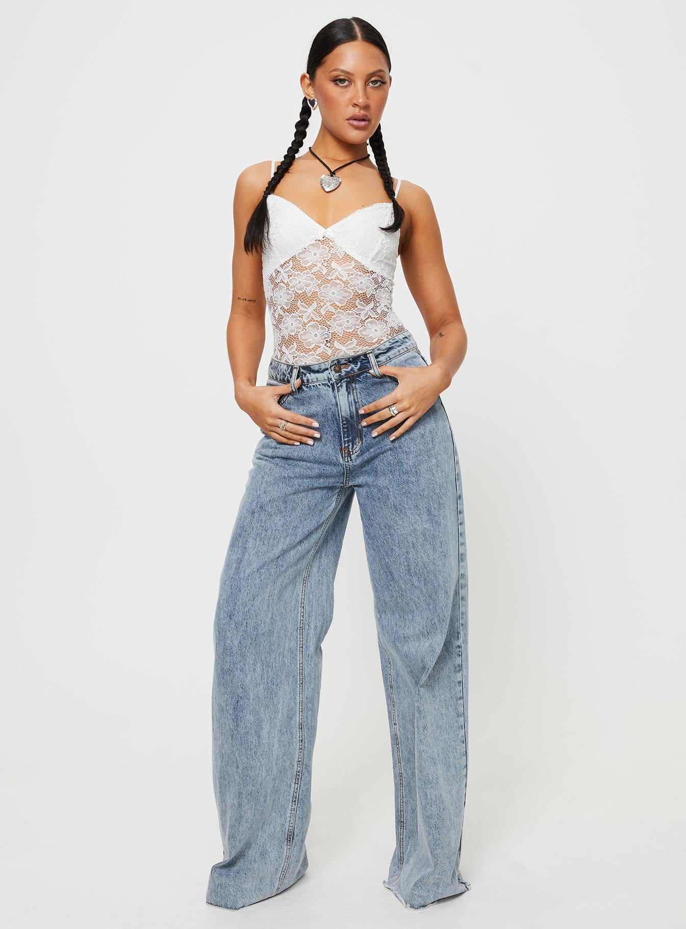 front view of model wearing Princess Polly Pennard Lace Bodysuit White Sleeveless 