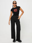 front view of model wearing Princess Polly Jeller Pinstripe Pants Black Petite High Waisted Pants 