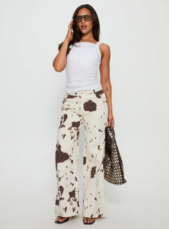 front view of model wearing Princess Polly Big Dreamer Low Rise Straight Leg Jeans Cow Print Low Rise Jeans 