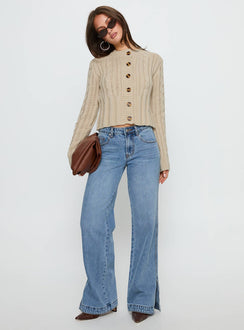 side view of model wearing Princess Polly Donielle Cable Knit Cardigan Beige cropped 