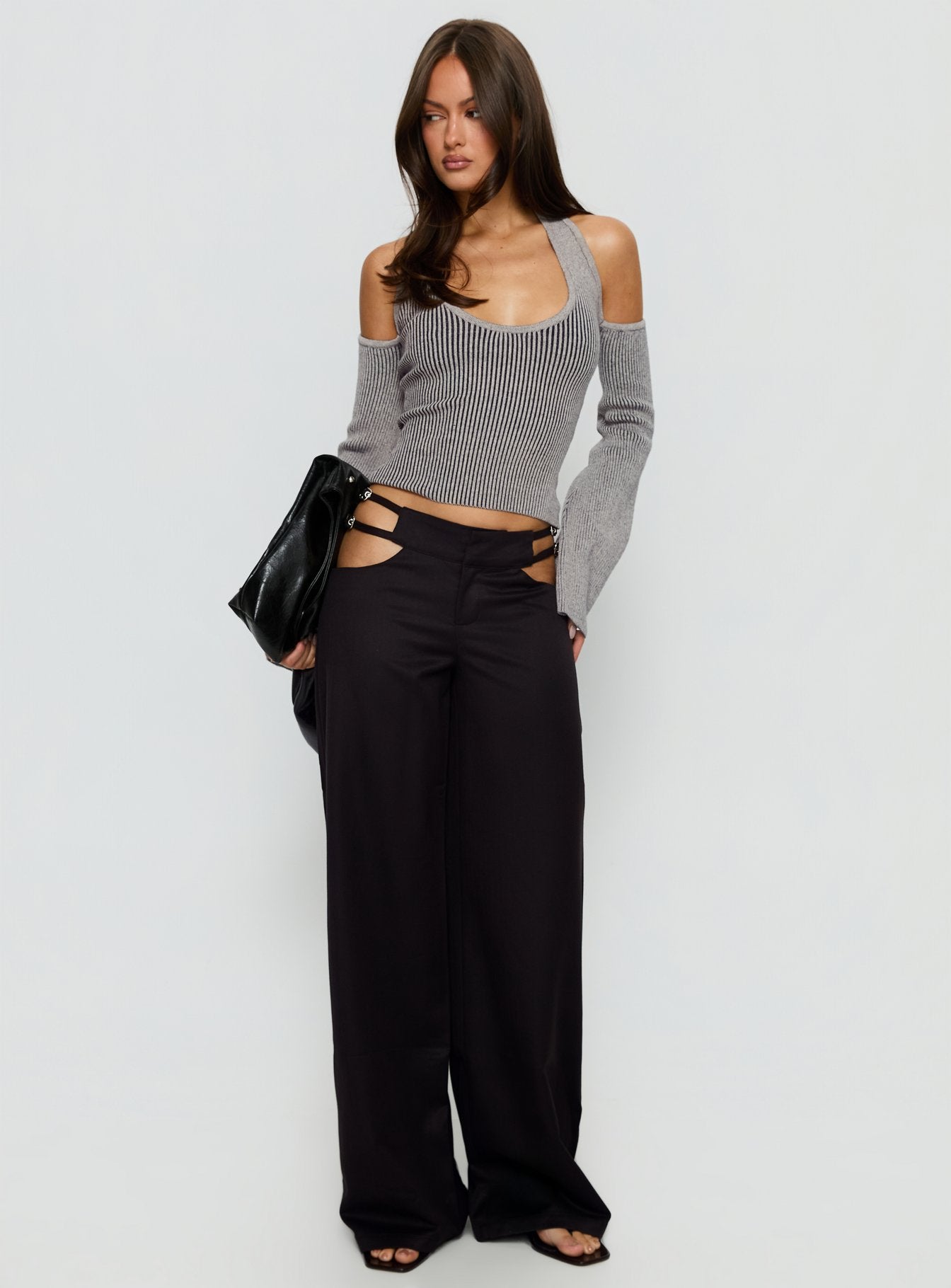 side view of model wearing Princess Polly Venicia Belt Detail Suiting Pant Black Pinstripe Mid Rise Pants 