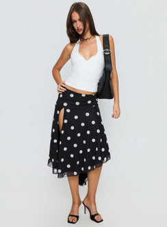   side view of model wearing Princess Polly Dulciana High Split Asymmetrical Midi Skirt Black / Polka Dot Midi Skirts 