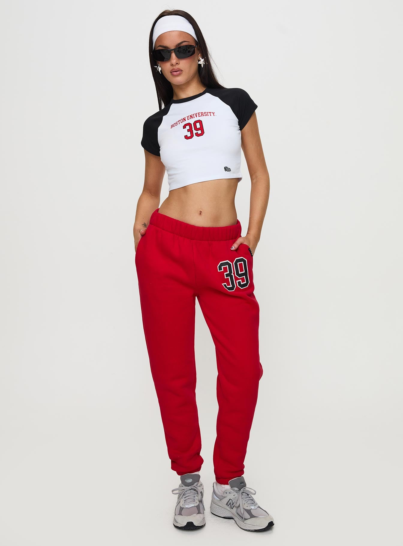 front view of model wearing Princess Polly BU Sweatpants Red High Waisted Pants 