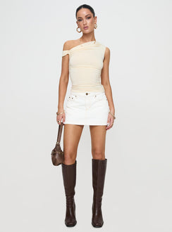   front view of model wearing Princess Polly Nicolina Low Rise Denim Mini Skirt Ecru Mini Skirts 