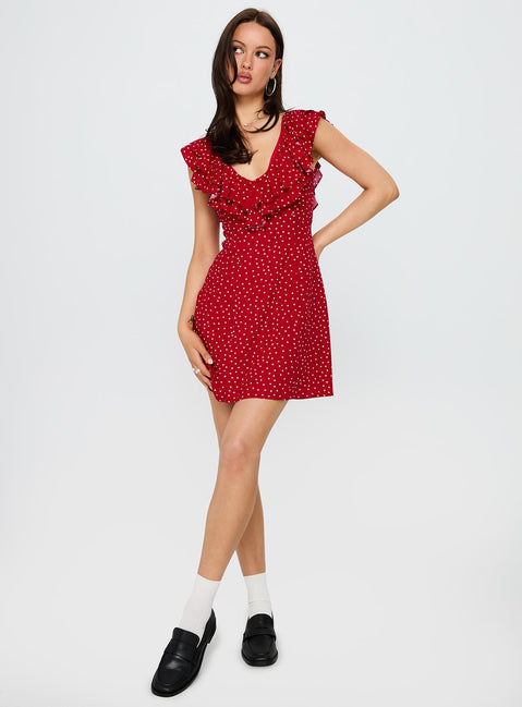 side view of model wearing Princess Polly Cherry Schnapps Flutter Mini Dress Red Polka V-Neck 