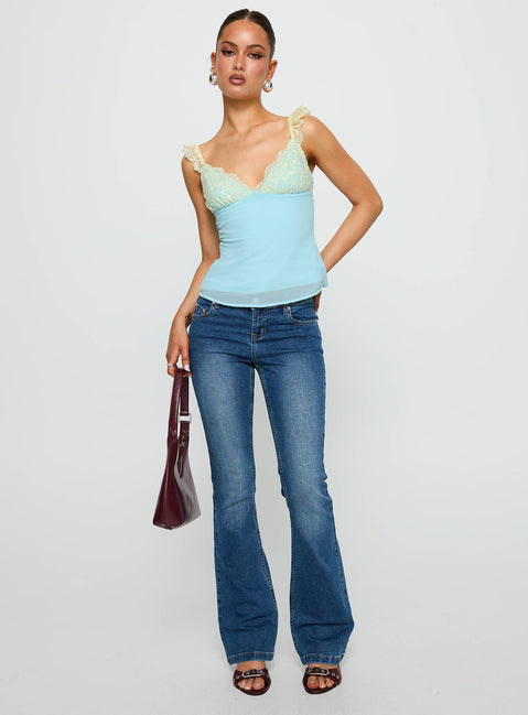 front view of model wearing Princess Polly Delvonte Top Blue / Yellow Sleeveless V-Neck 