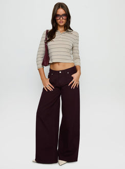 front view of model wearing Princess Polly Supercut Low Rise Baggy Pleat Jeans Currant Mid Rise Jeans 