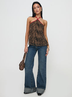 front view of model wearing Princess Polly Rafaella Halter Top Leopard Sleeveless Asymmetric Neckline 