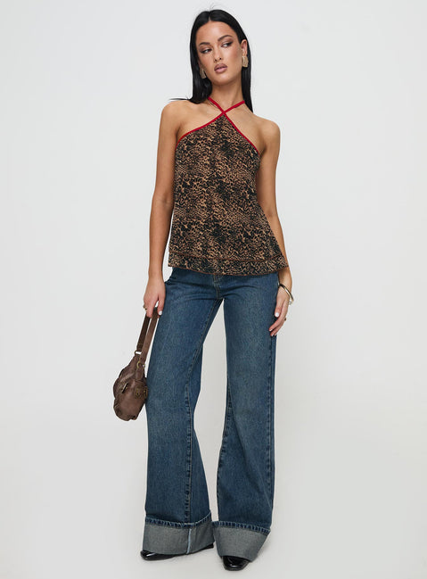 front view of model wearing Princess Polly Rafaella Halter Top Leopard Sleeveless Asymmetric Neckline 