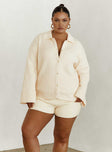 Front view of model wearing  front Princess Polly Three Fourth Sleeves V-Neck  Jhett Long Sleeve Knit Shirt Cream Curve