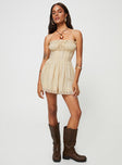 Strapless playsuit  Lace details, ruffle neckline, adjustable tie at neckline, shirred back, twin hip pockets 