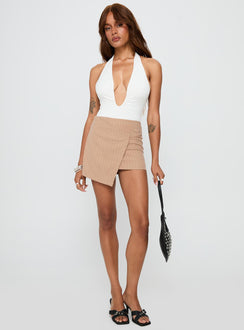 side view of model wearing Princess Polly Emmalyne Plunge Neck Bodysuit White Sleeveless 