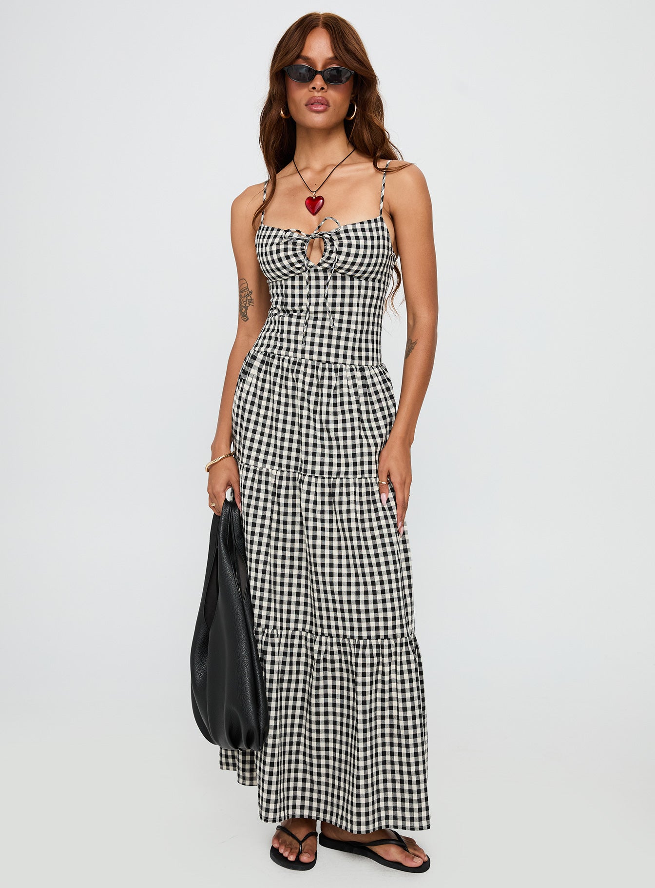 front view of model wearing Princess Polly Avaleine Tiered Maxi Dress Black / White Check Sweetheart Neckline 