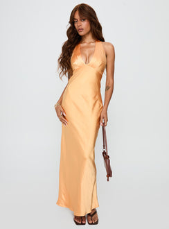 side view of model wearing Princess Polly Good For You Halter Maxi Dress Orange Plunger 