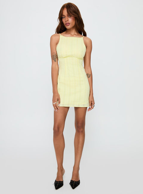 front view of model wearing Princess Polly I Know Places Mini Dress Lemon Scoop Neck 