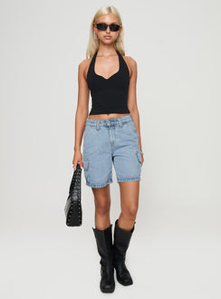 side view of model wearing Princess Polly Mika Carpenter Denim Shorts Light Wash High Waisted Shorts 