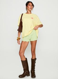 front view of model wearing Princess Polly Firenze Flower Market Graphic Top Yellow Half Sleeves Crew Neck 