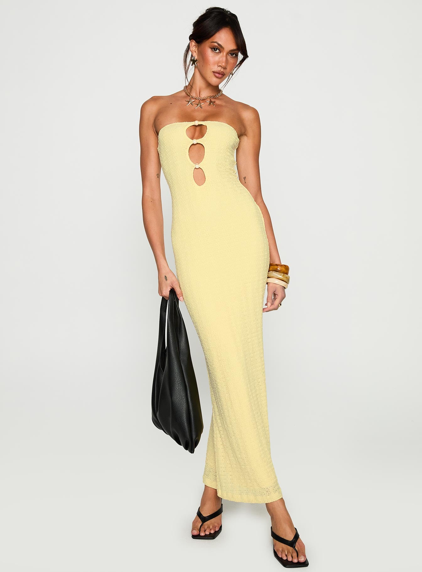 side view of model wearing Princess Polly Saijana Strapless Maxi Dress Lemon Straight Neck 