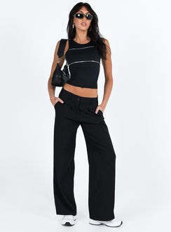 front view of model wearing Princess Polly Archie Low Rise Pants Black Tall Mid Rise 