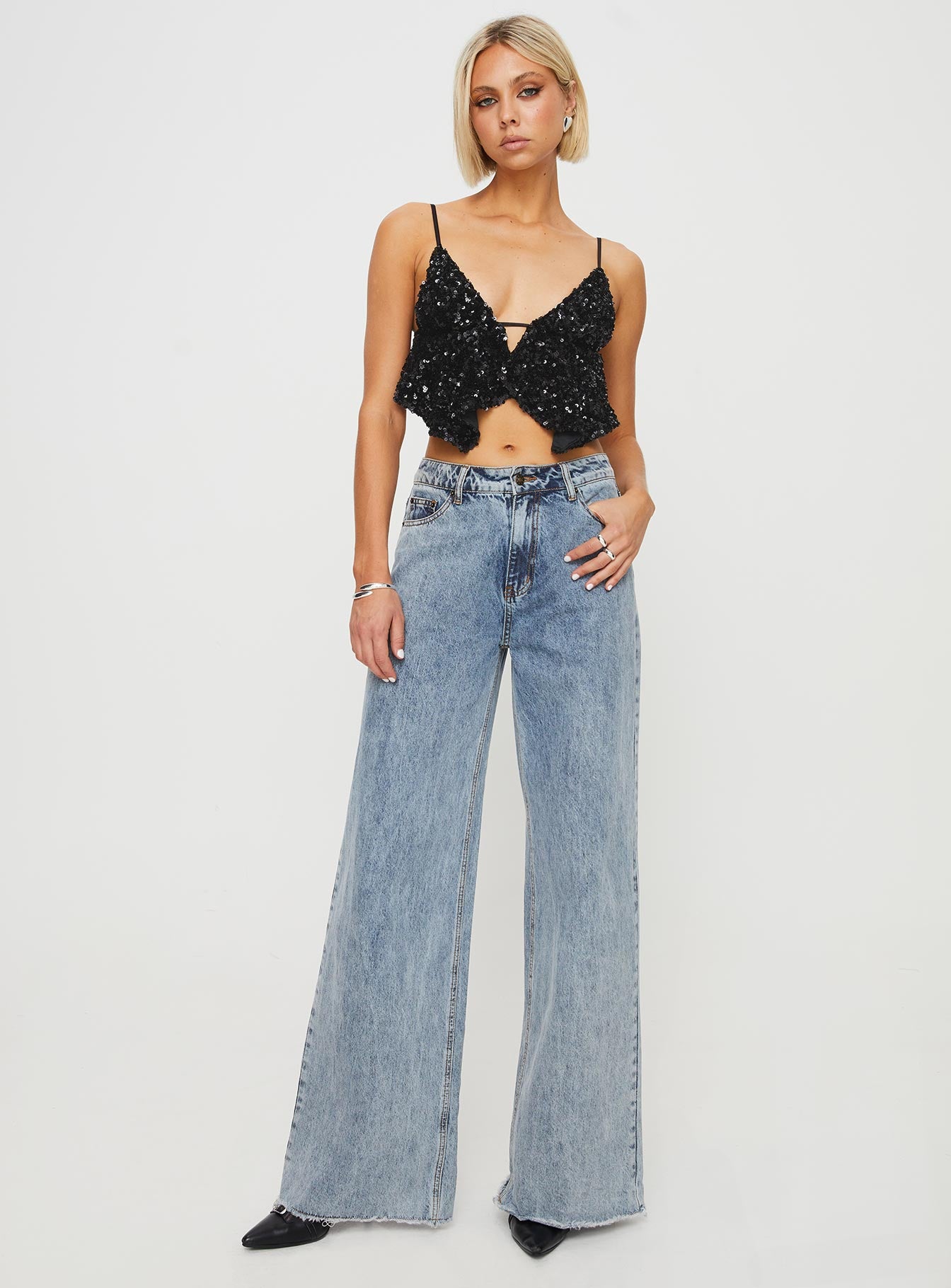 Front view of model wearing  front Princess Polly Sleeveless Scoop Neck  Rosaton Top Black