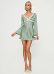 Silky long sleeve mini dress V neckline, lace trim, tie fastening at back, invisible zip fastening at side