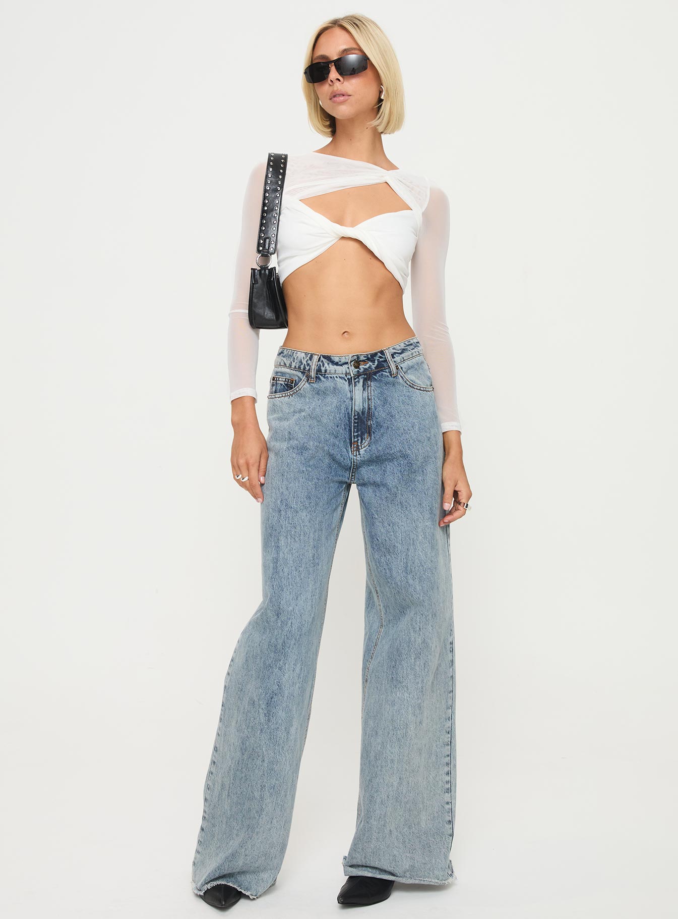 front view of model wearing Princess Polly Middleton Long Sleeve Top White Full Sleeves Asymmetric Neckline 