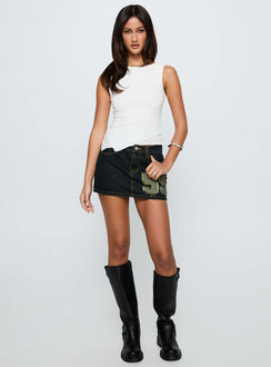   side view of model wearing Princess Polly Standout Patch Detail Denim Skort Blue Mini Skirts 