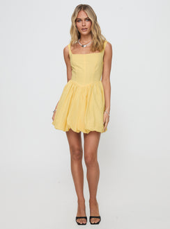 back view of model wearing Princess Polly Alcott Bubble Hem Mini Dress Lemon Square Neck 