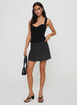 front view of model wearing Princess Polly Manuel Top Black Sleeveless Sweetheart 